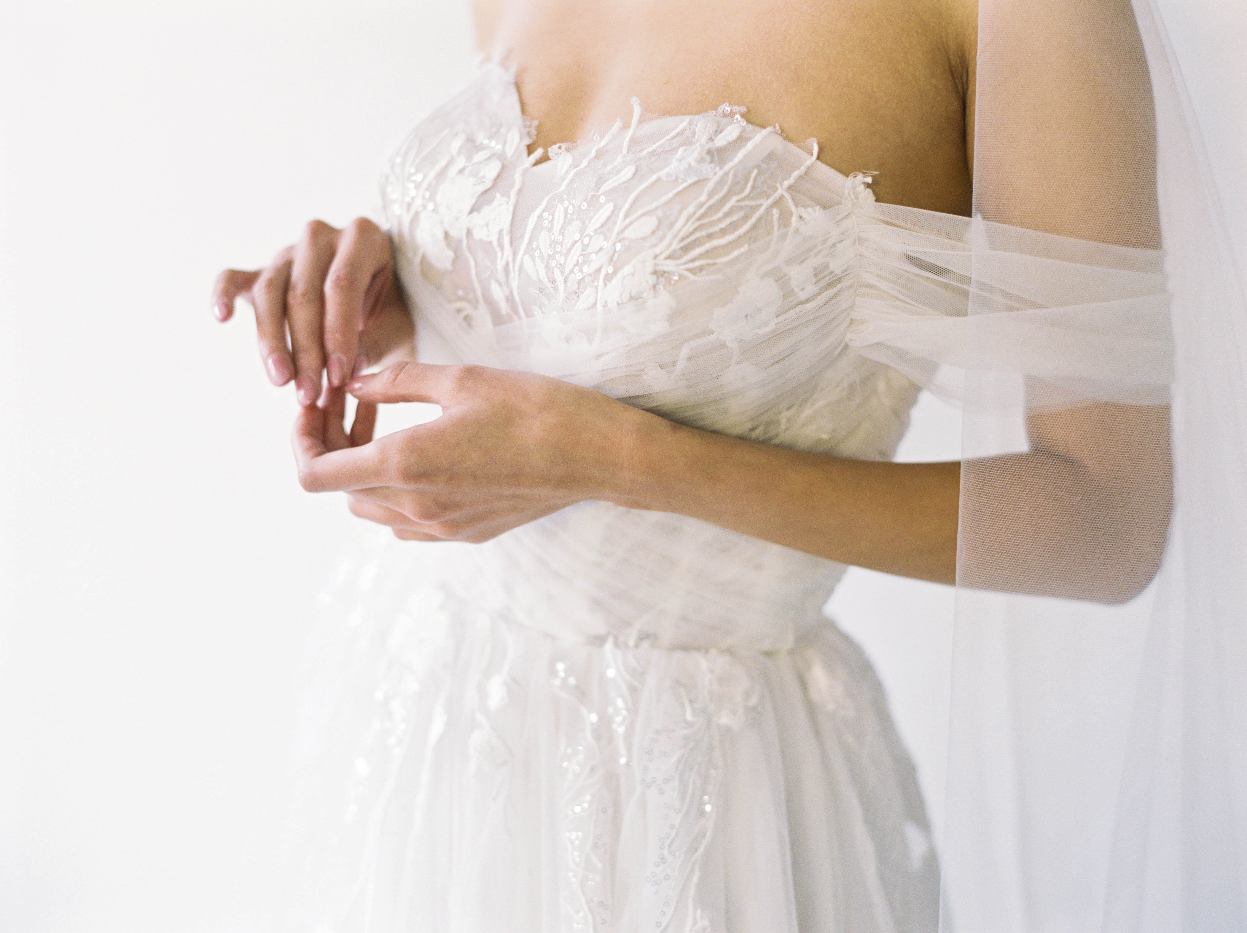 Romantic white strapless a-line wedding dress with beading embellishment  from Anjolique's Spring 201